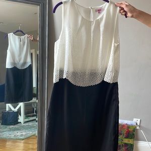 A formal black and white dress